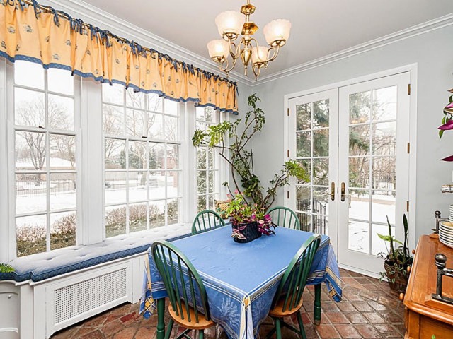 7600 Augusta Street River Forest, IL 60305 - Photo 10 of 25 a view of a dining room with furniture window and outside view