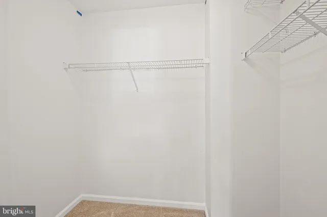 a view of small space with racks on the wall