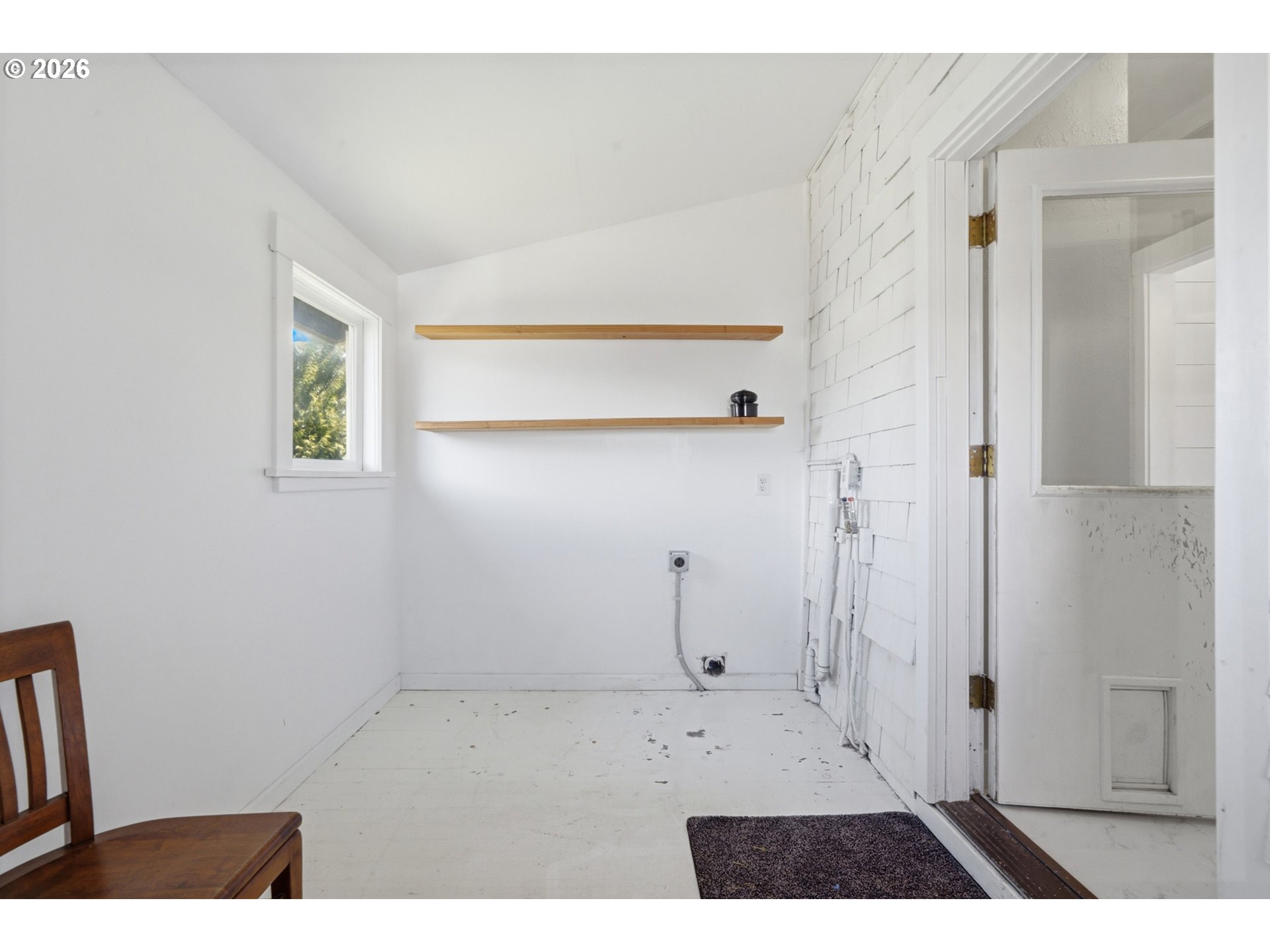 1802 8th Street Tillamook, OR 97141 - Photo 25 of 37 a bathroom with a black shower