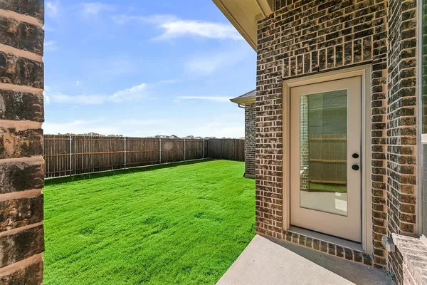 a view of a backyard with a garden