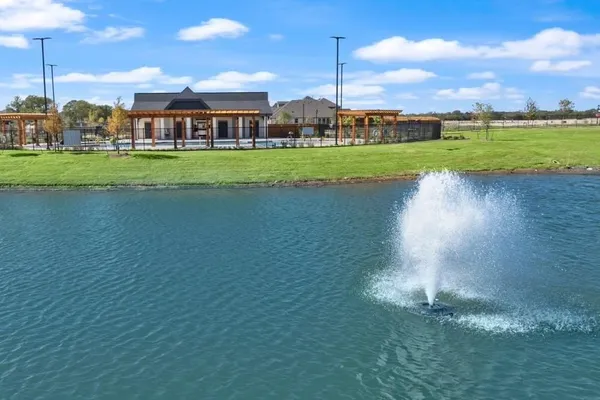 a view of a big building with a big yard