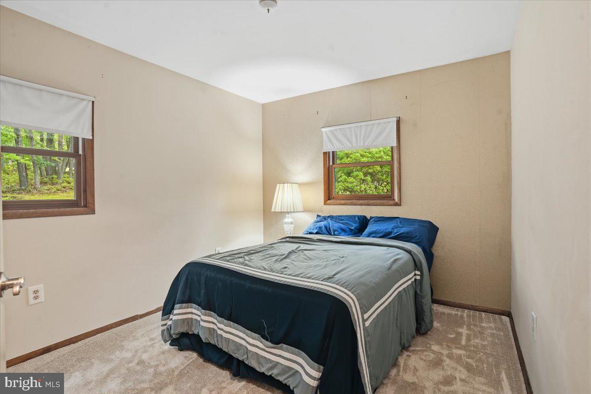 177 Jay Effort, PA 18330 - Photo 27 of 47 Serene bedroom with nature views.