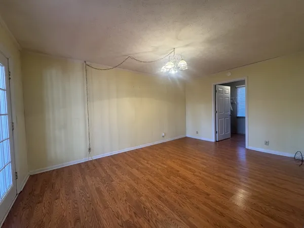 a bathroom with a toilet and a bathtub
