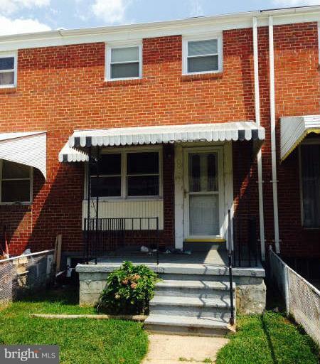 8216 Kavanagh Road Baltimore, MD 21222 - Photo 1 of 1 a front view of a house with a yard