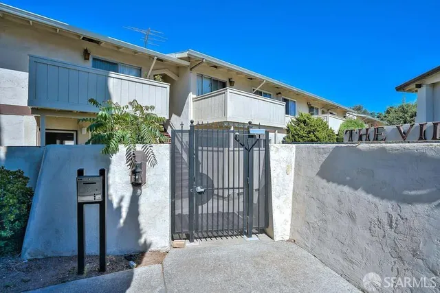a front view of a house with a garage