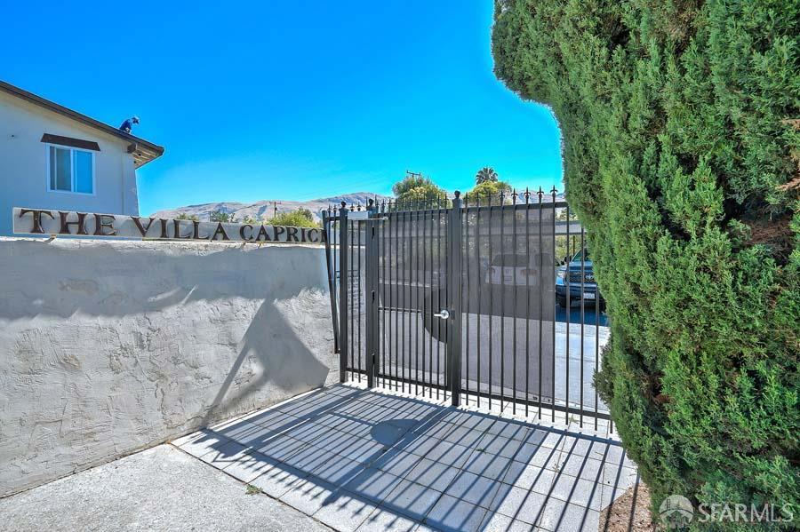 46728 Crawford Street, Unit 3 Fremont, CA 94539 - Photo 19 of 22 a view of a balcony with wooden floor and fence