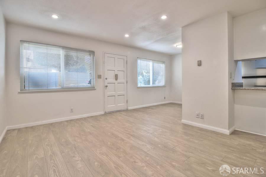 46728 Crawford Street, Unit 3 Fremont, CA 94539 - Photo 5 of 22 an empty room with windows and closet