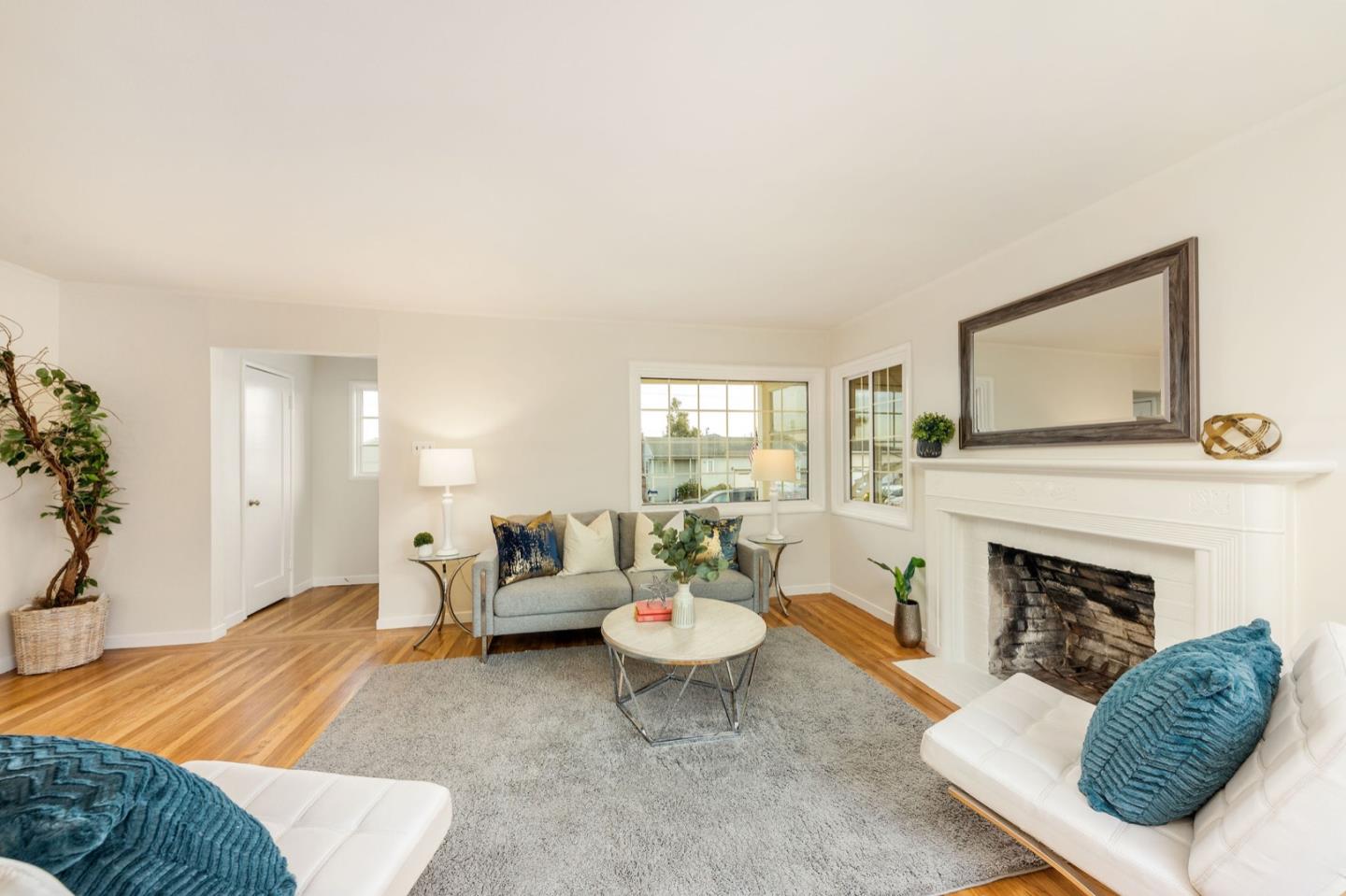 224 Helen Drive Millbrae, CA 94030 - Photo 11 of 42 a living room with furniture and a fireplace