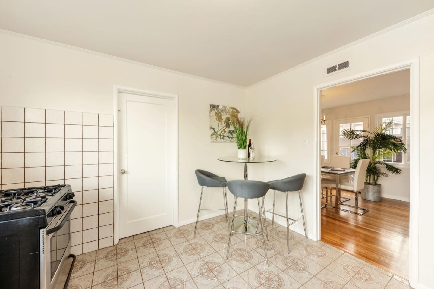 224 Helen Drive Millbrae, CA 94030 - Photo 16 of 42 a dining room with furniture and wooden floor