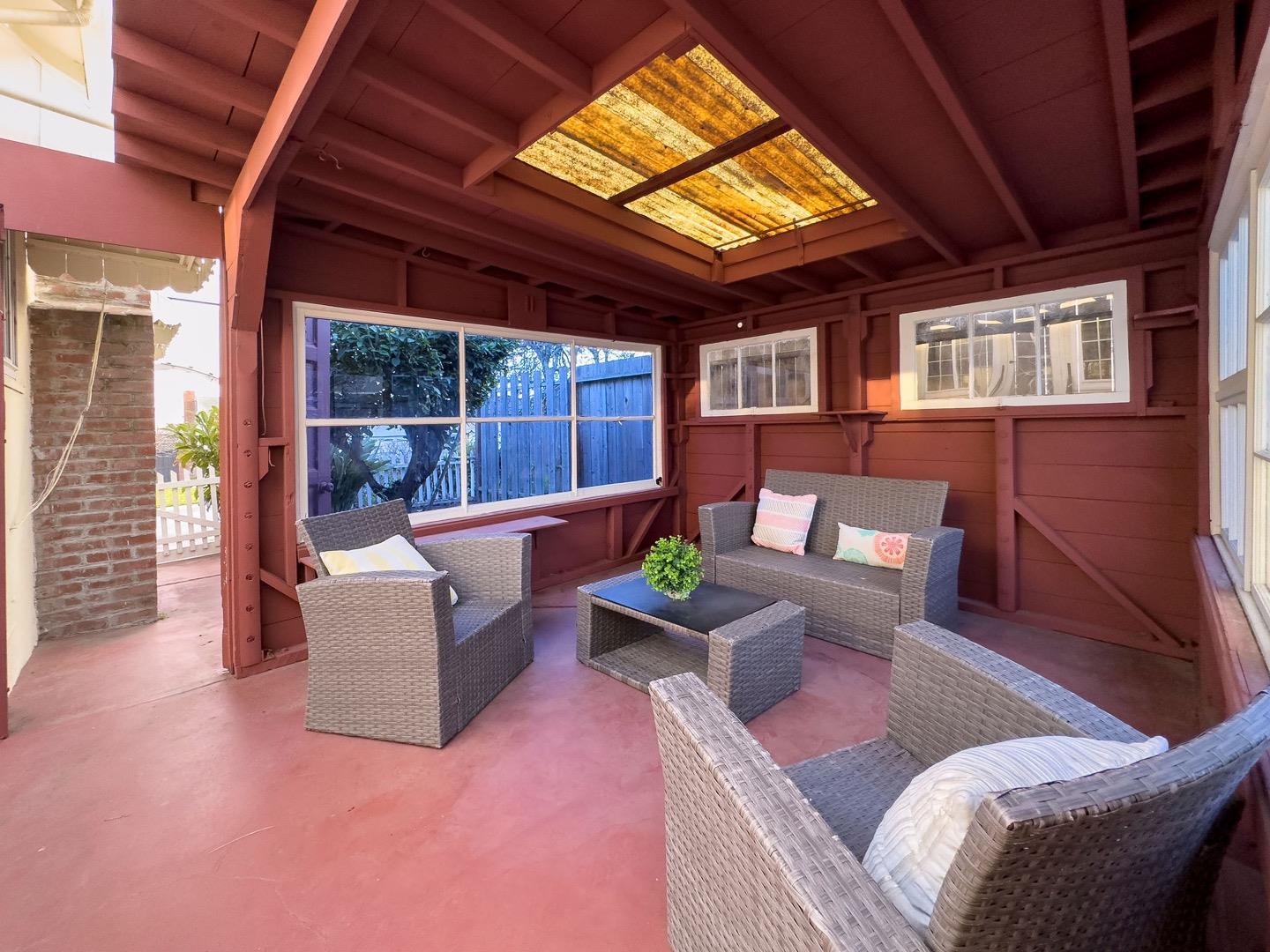 224 Helen Drive Millbrae, CA 94030 - Photo 33 of 42 a living room with furniture and a large window