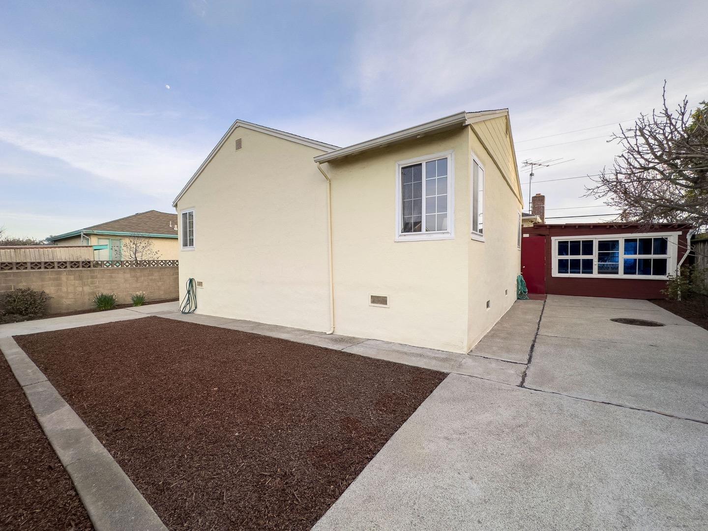 224 Helen Drive Millbrae, CA 94030 - Photo 37 of 42 a front view of a house with a yard and garage