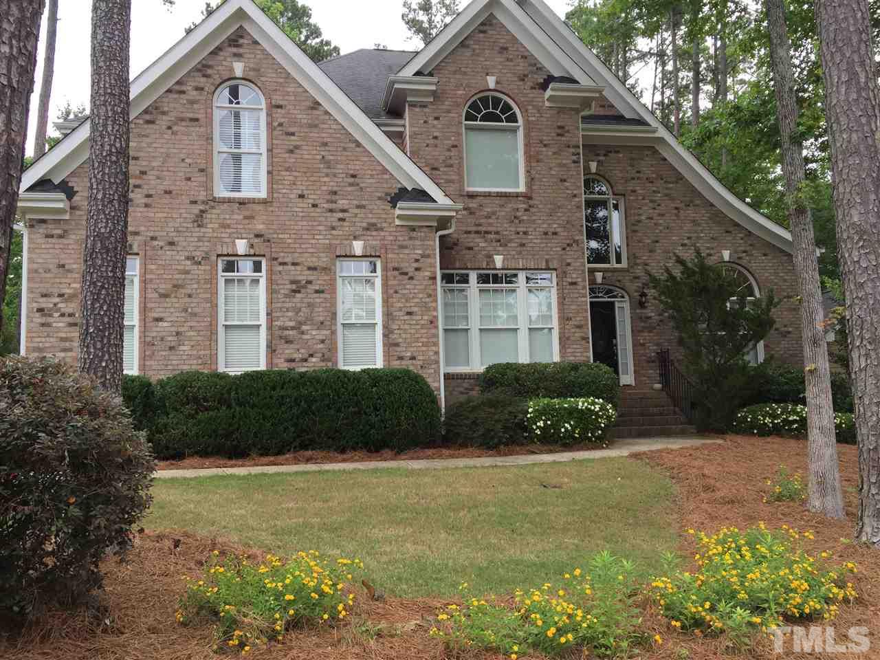 7217 Duncans Ridge Way Fuquay-Varina, NC 27526 - Photo 2 of 25 a front view of a house with a yard