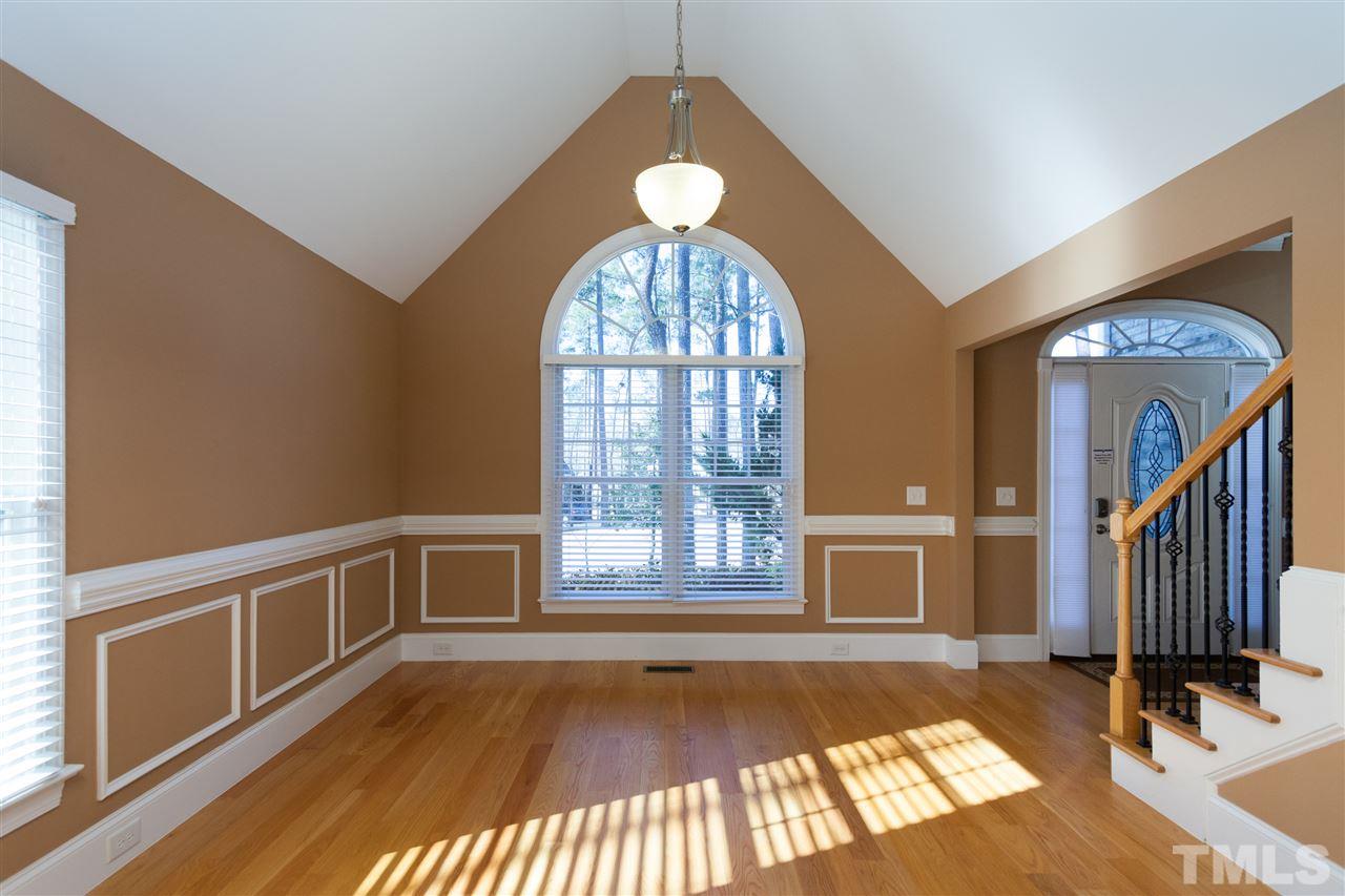 7217 Duncans Ridge Way Fuquay-Varina, NC 27526 - Photo 13 of 25 a view of a livingroom with wooden floor and furniture