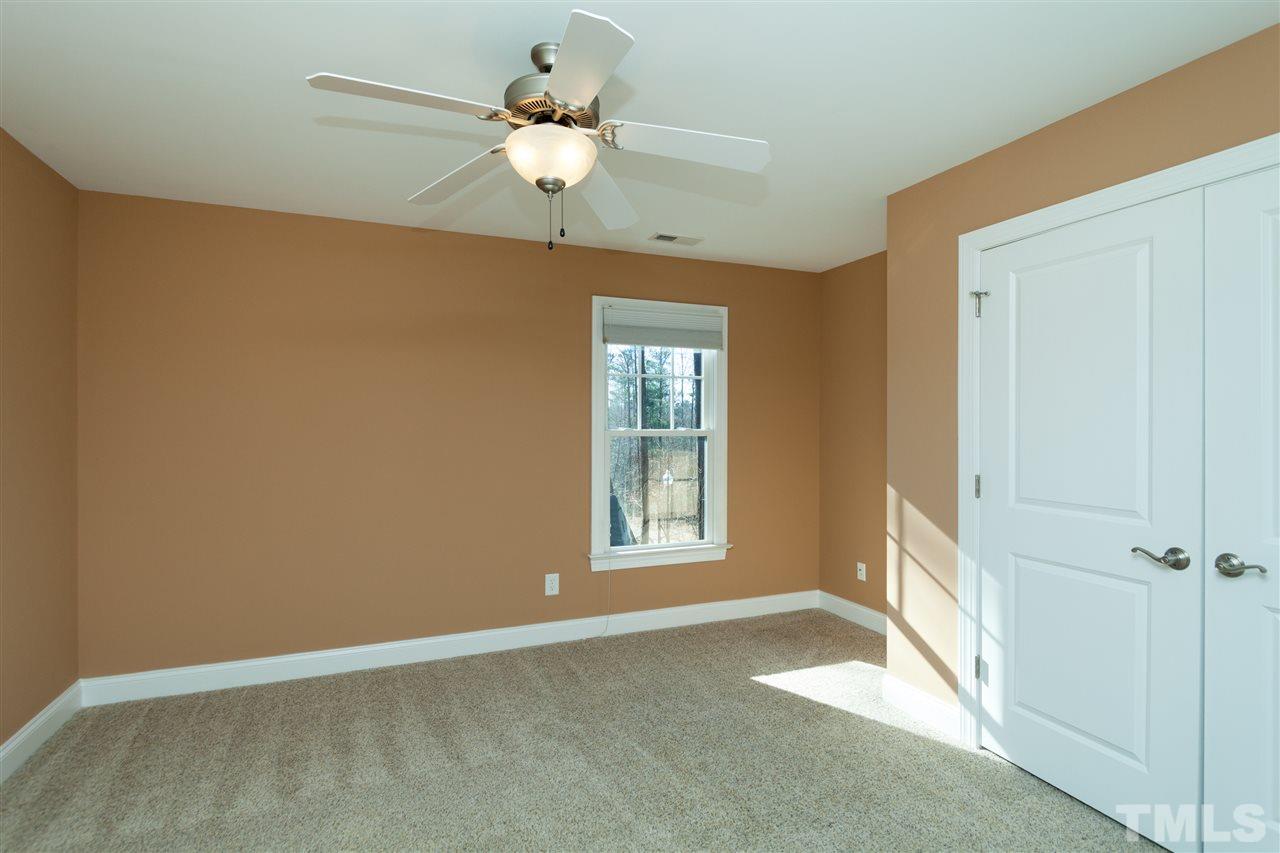 7217 Duncans Ridge Way Fuquay-Varina, NC 27526 - Photo 19 of 25 a view of an empty room with a window