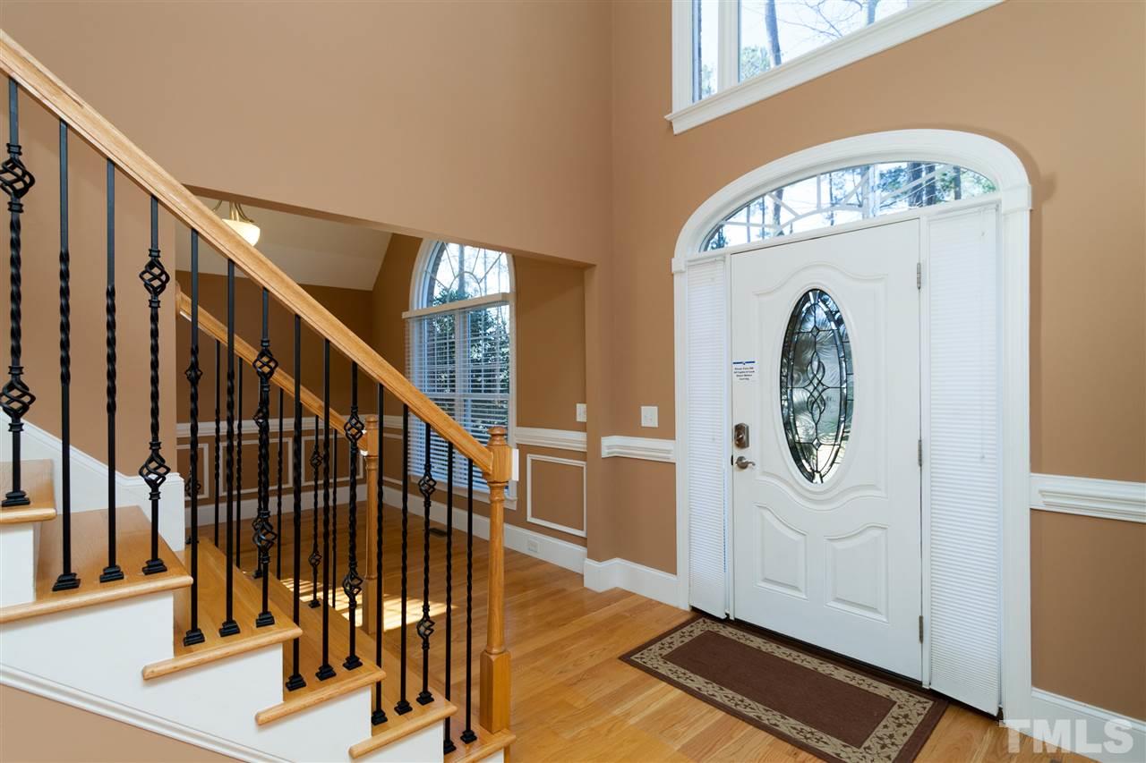 7217 Duncans Ridge Way Fuquay-Varina, NC 27526 - Photo 3 of 25 a view of entryway with wooden floor