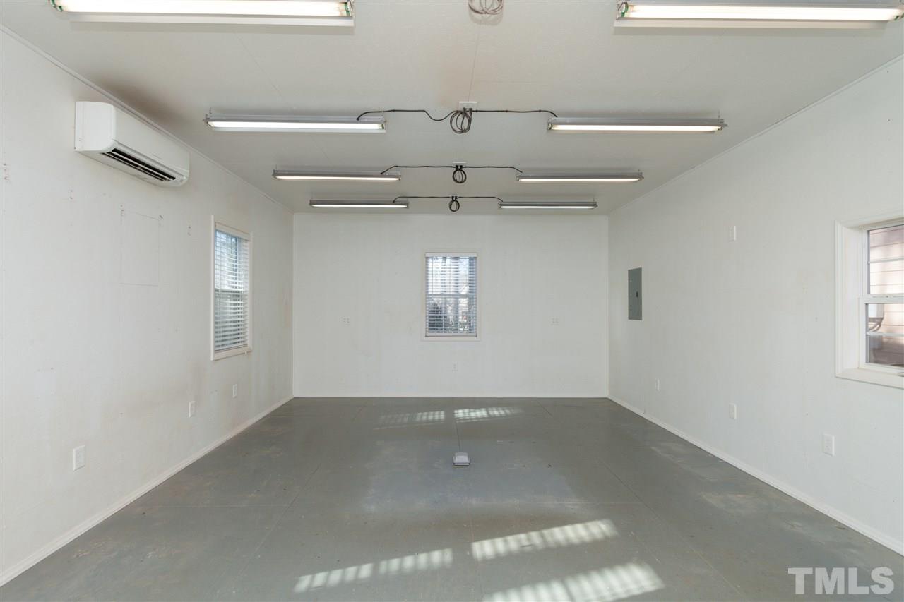 7217 Duncans Ridge Way Fuquay-Varina, NC 27526 - Photo 22 of 25 a view of a ceiling fan in a room