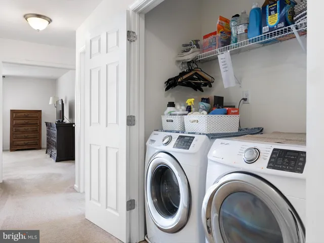 a view of washer and dryer in a utility room