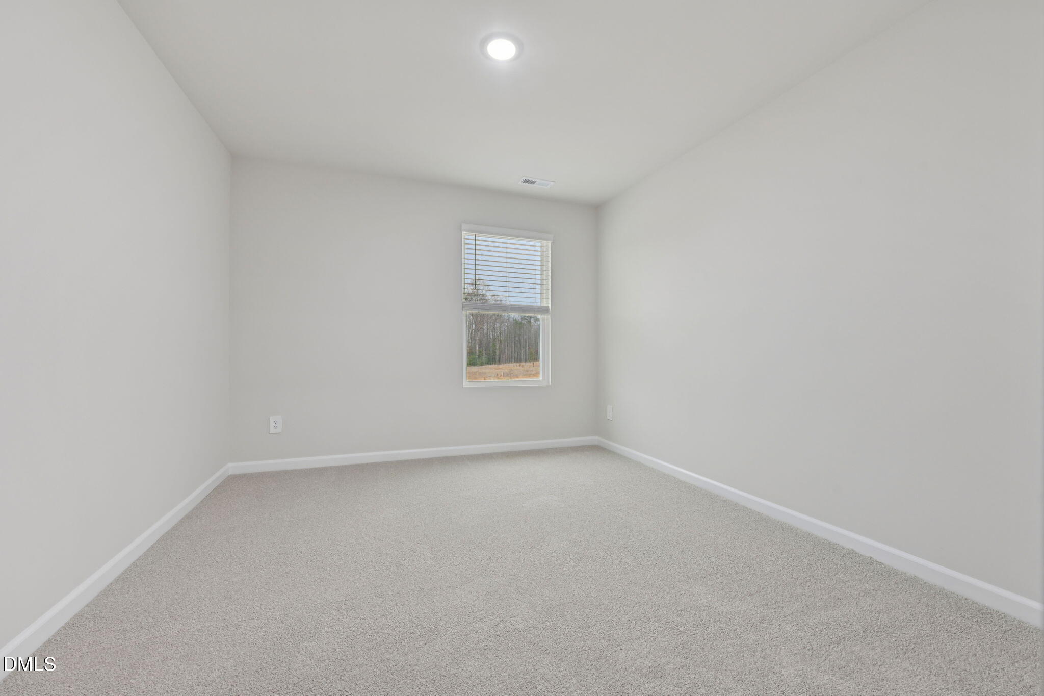 2147 Topsail Road Durham, NC 27703 - Photo 29 of 31 an empty room with a window