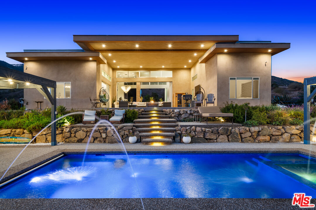 10715 Yerba Buena Road Malibu, CA 90265 - Photo 32 of 32 a view of a room with gym equipment