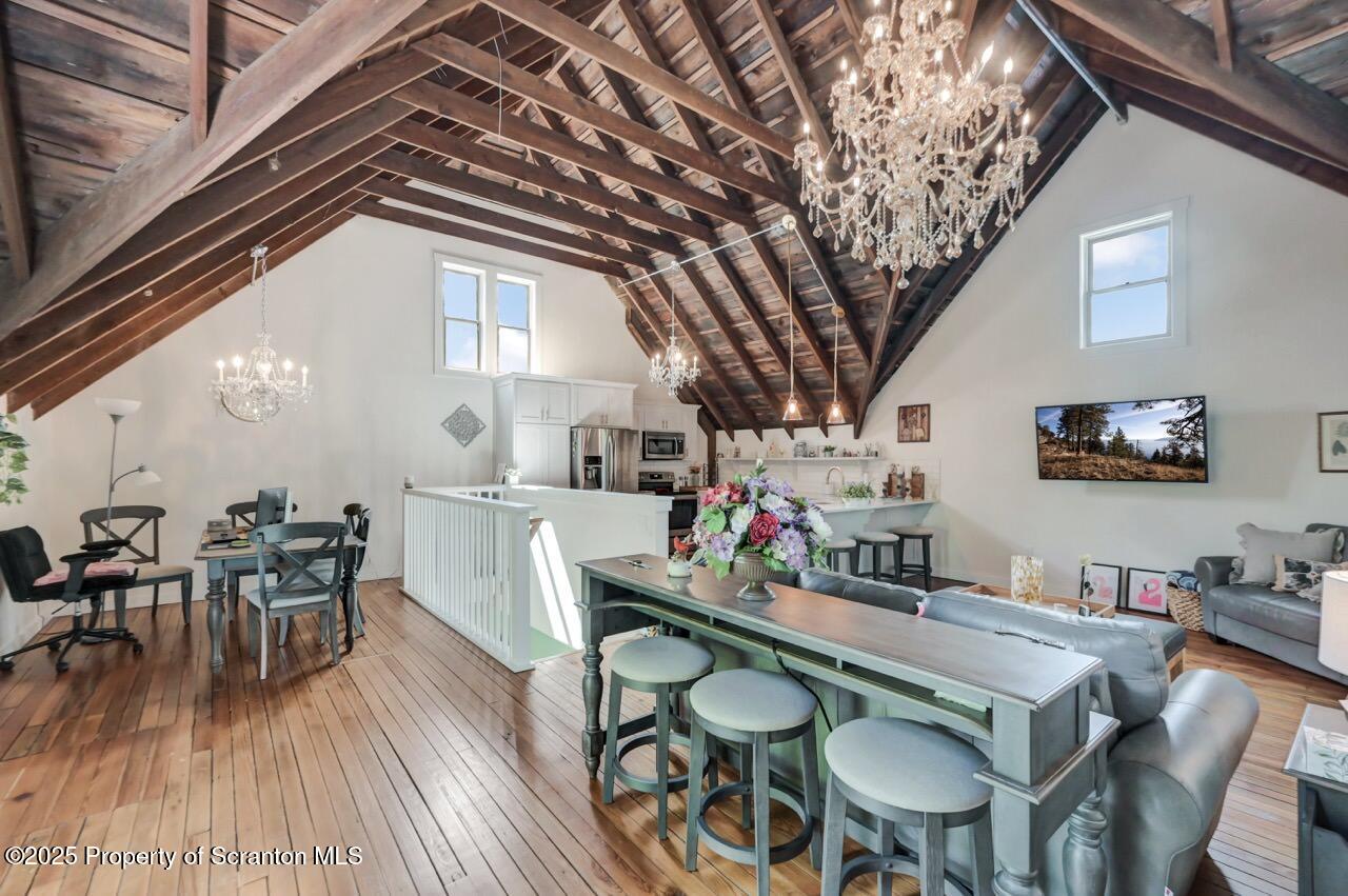 215 Fairview Road Clarks Green, PA 18411 - Photo 114 of 148 a dining room with furniture window and wooden floor