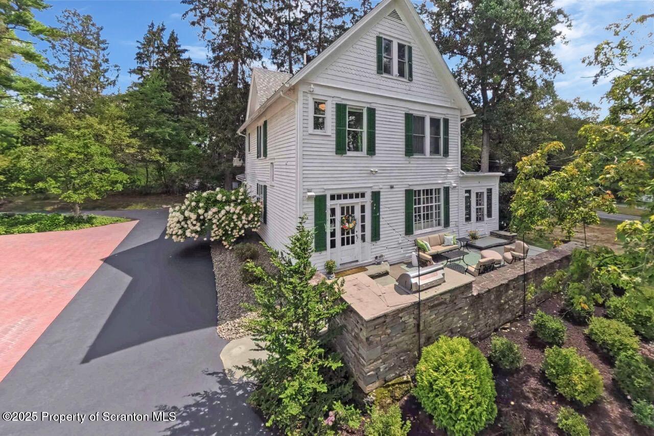 215 Fairview Road Clarks Green, PA 18411 - Photo 140 of 148 a front view of a house with a yard and outdoor seating