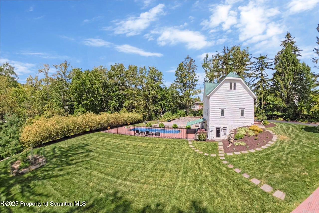 215 Fairview Road Clarks Green, PA 18411 - Photo 141 of 148 a view of a backyard with a garden and entertaining space