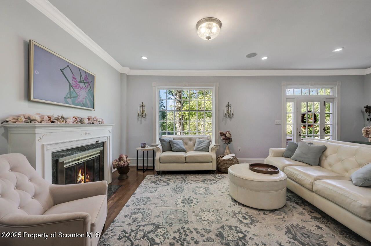 215 Fairview Road Clarks Green, PA 18411 - Photo 15 of 148 a living room with furniture and a fireplace
