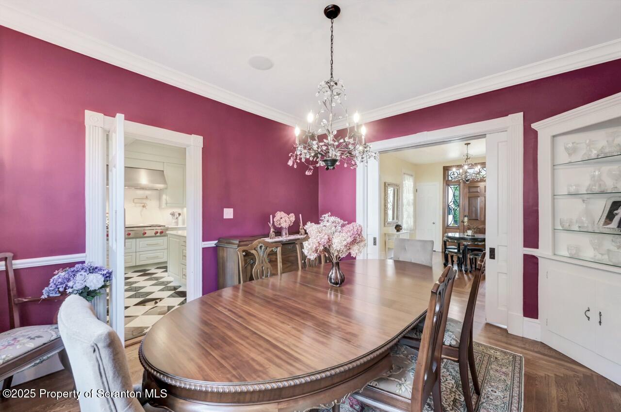 215 Fairview Road Clarks Green, PA 18411 - Photo 22 of 148 a dining room with furniture a chandelier and window