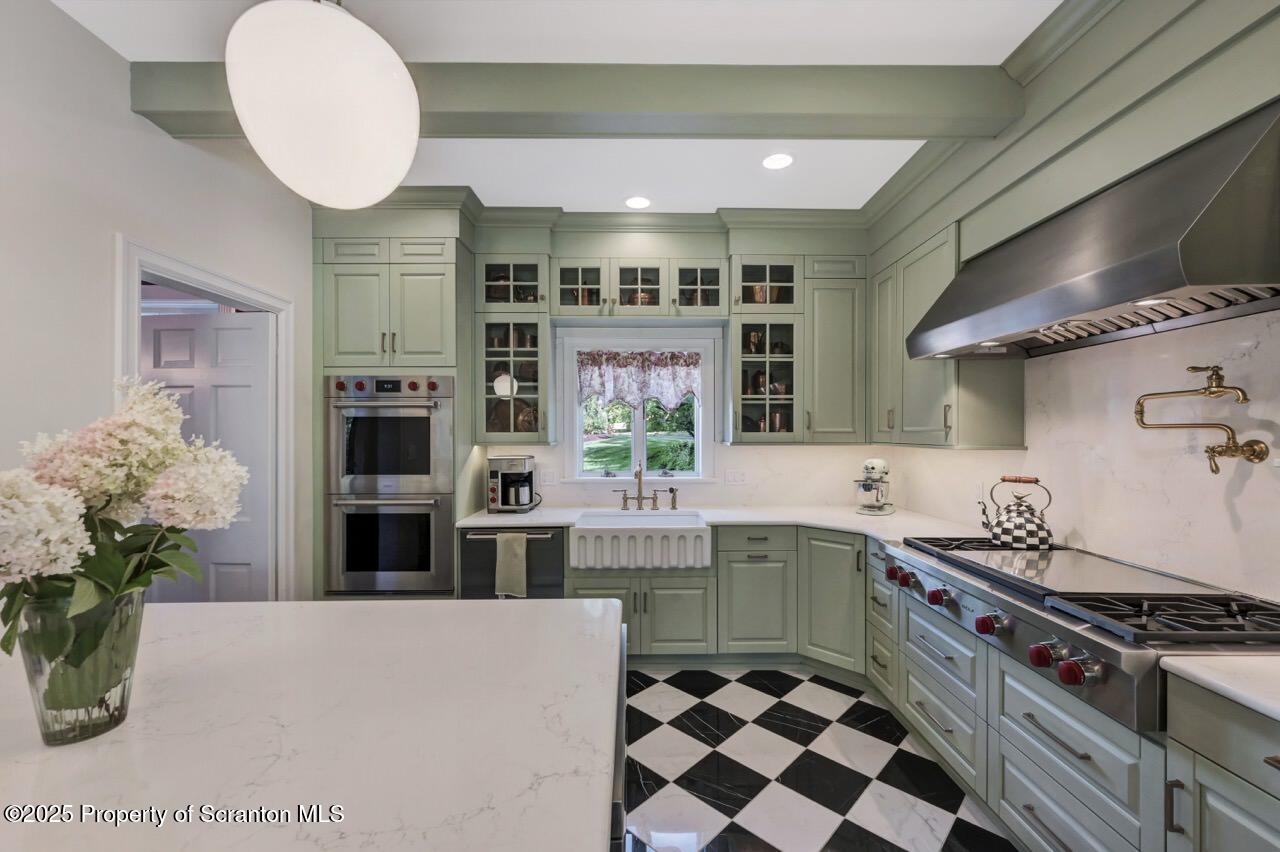 215 Fairview Road Clarks Green, PA 18411 - Photo 28 of 148 a kitchen with stainless steel appliances granite countertop a stove a sink and a refrigerator