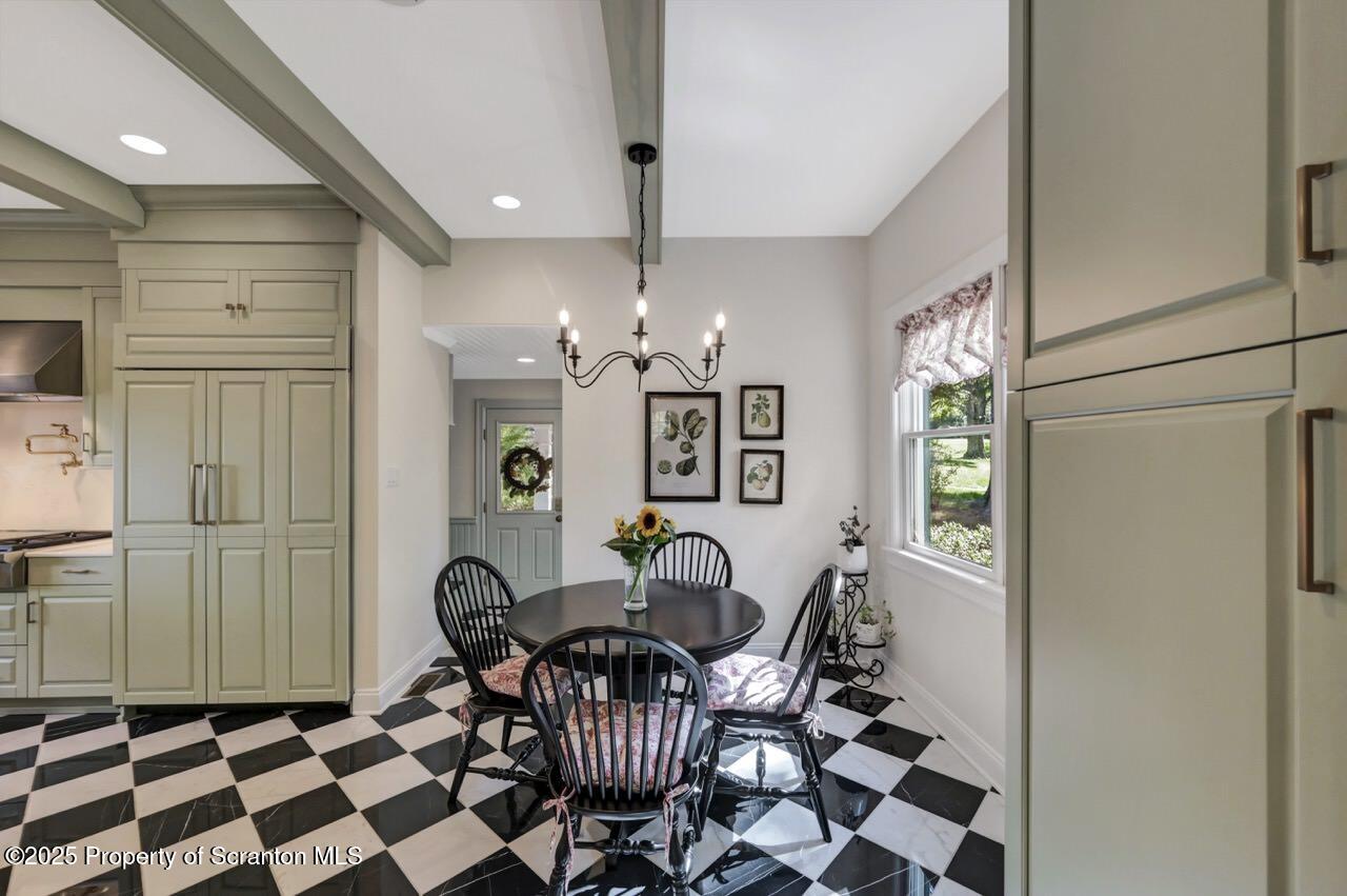 215 Fairview Road Clarks Green, PA 18411 - Photo 30 of 148 a view of a dining room with furniture and chandelier