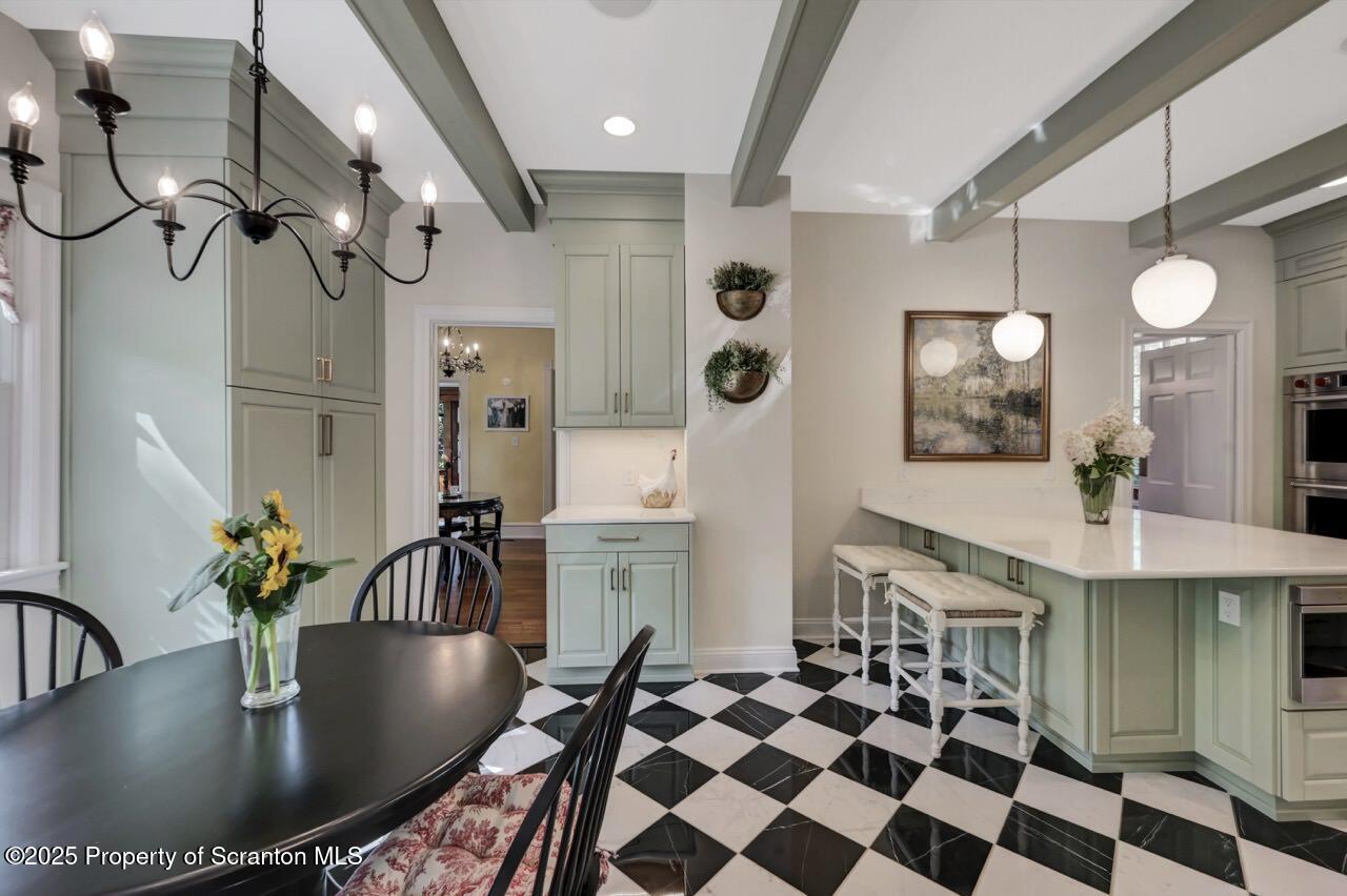 215 Fairview Road Clarks Green, PA 18411 - Photo 31 of 148 a kitchen with stainless steel appliances granite countertop a sink a stove and refrigerator