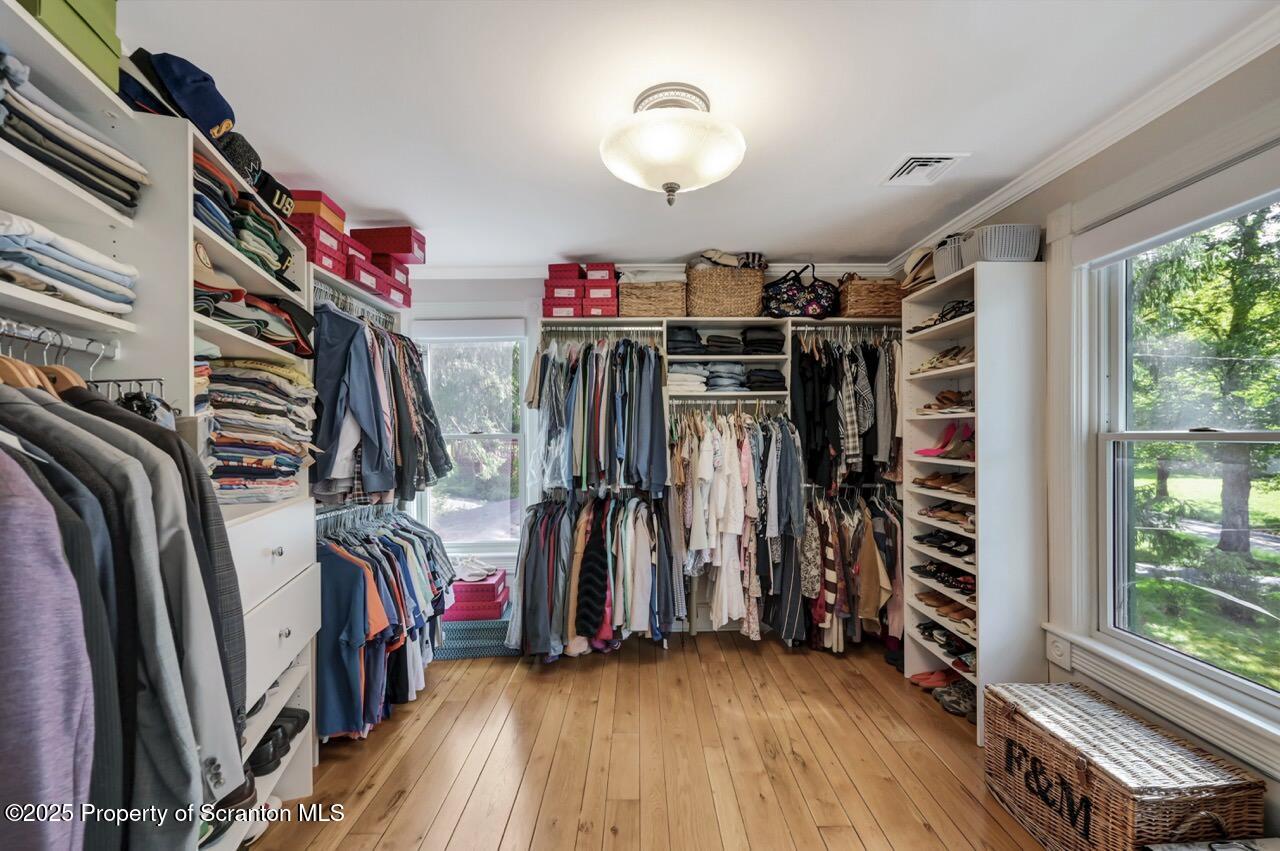 215 Fairview Road Clarks Green, PA 18411 - Photo 45 of 148 a view of walk in closet with clothes and shoes