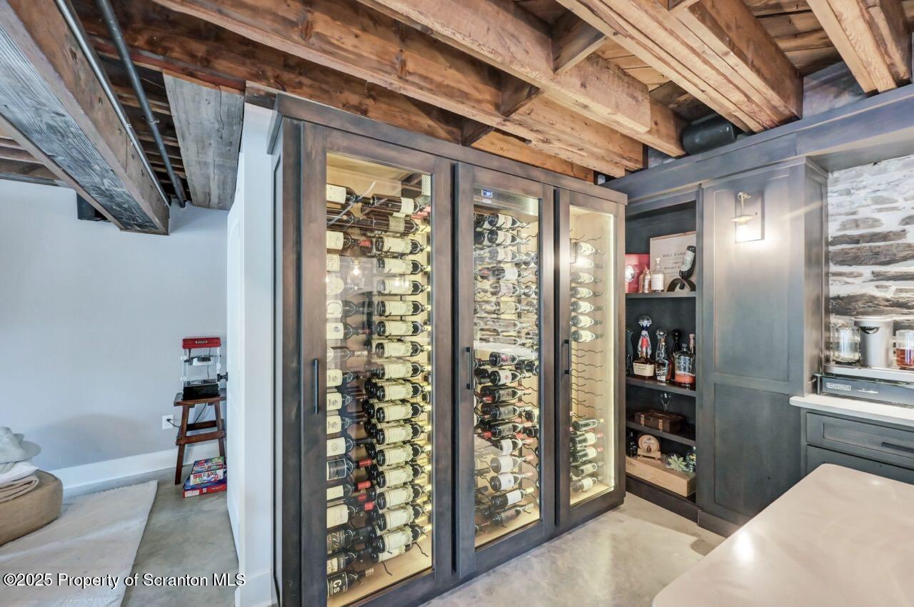 215 Fairview Road Clarks Green, PA 18411 - Photo 98 of 148 a view of walk in closet with clothes and shoes