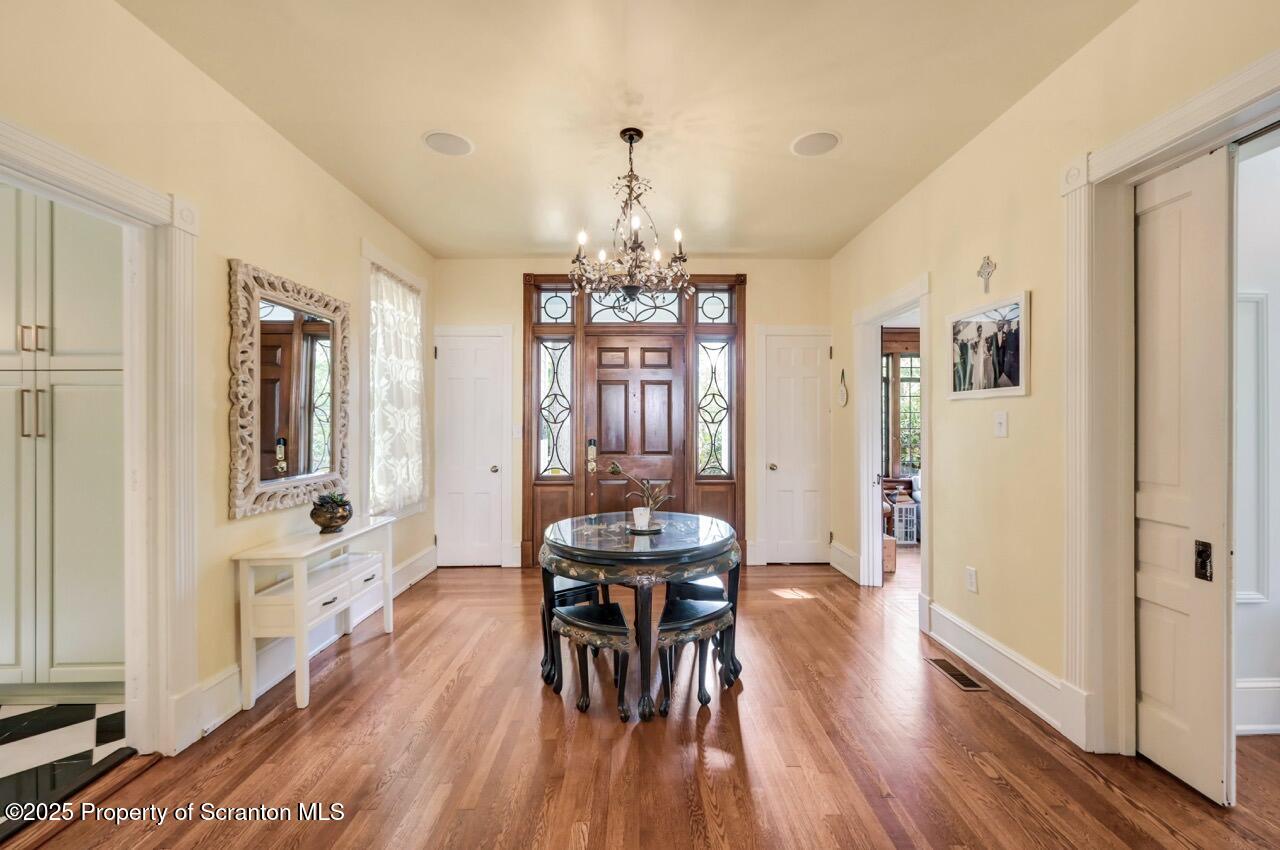 215 Fairview Road Clarks Green, PA 18411 - Photo 10 of 148 a view of a dining room with furniture window and wooden floor