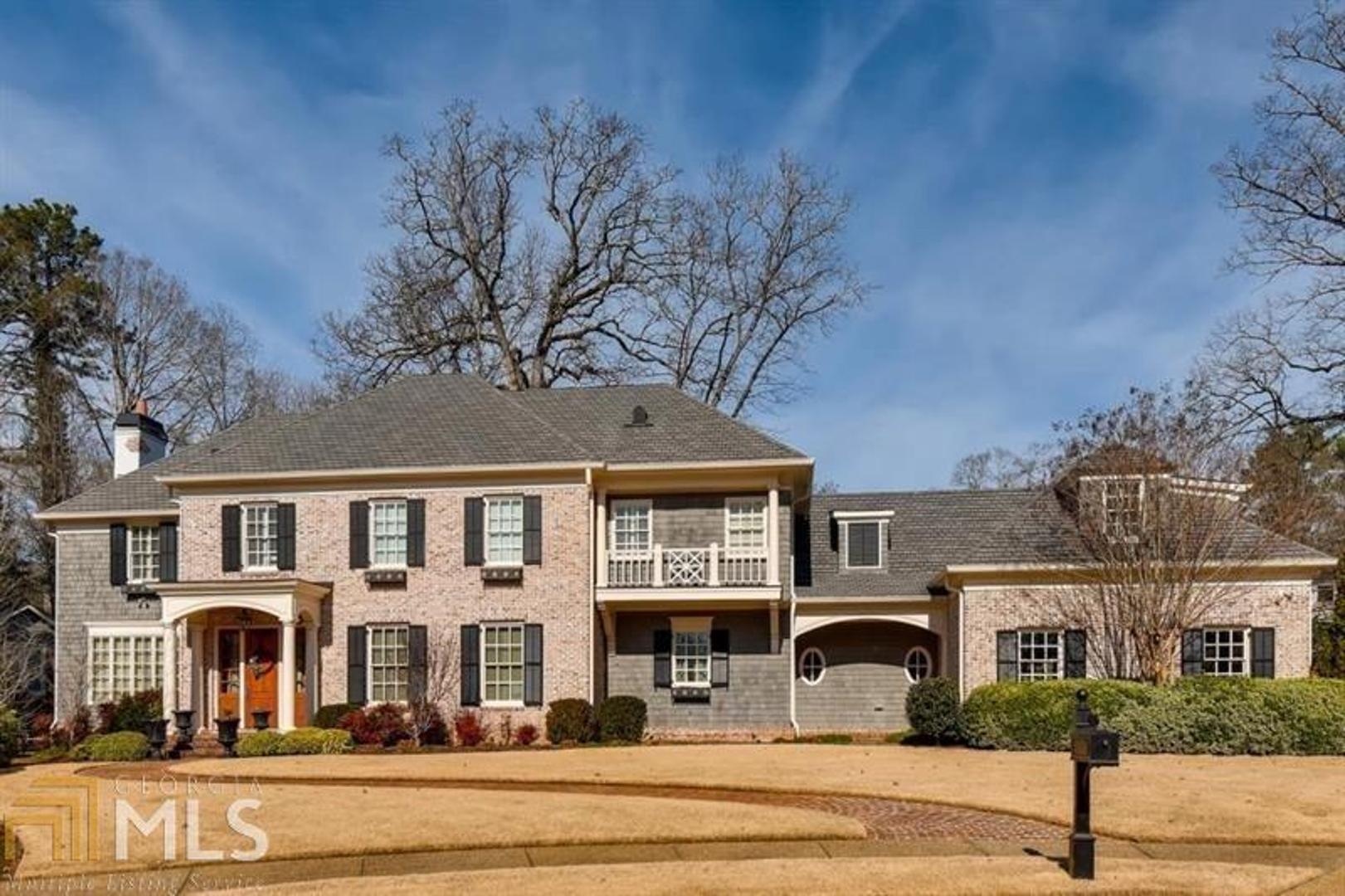 This large Buckhead home sits on a wonderful, flat lot in a cul de sac.