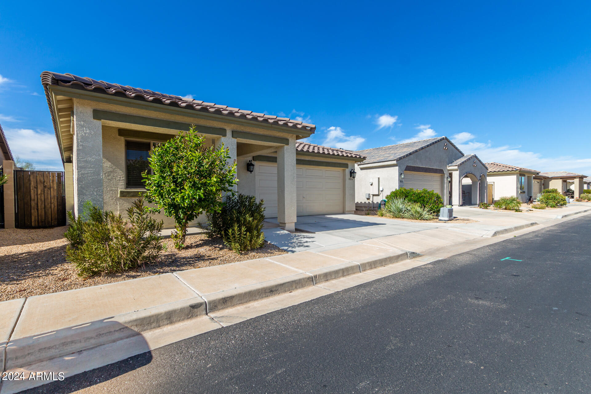 1832 South Hayley Road Apache Junction, AZ 85119 - Photo 14 of 30 a front view of a house with garden
