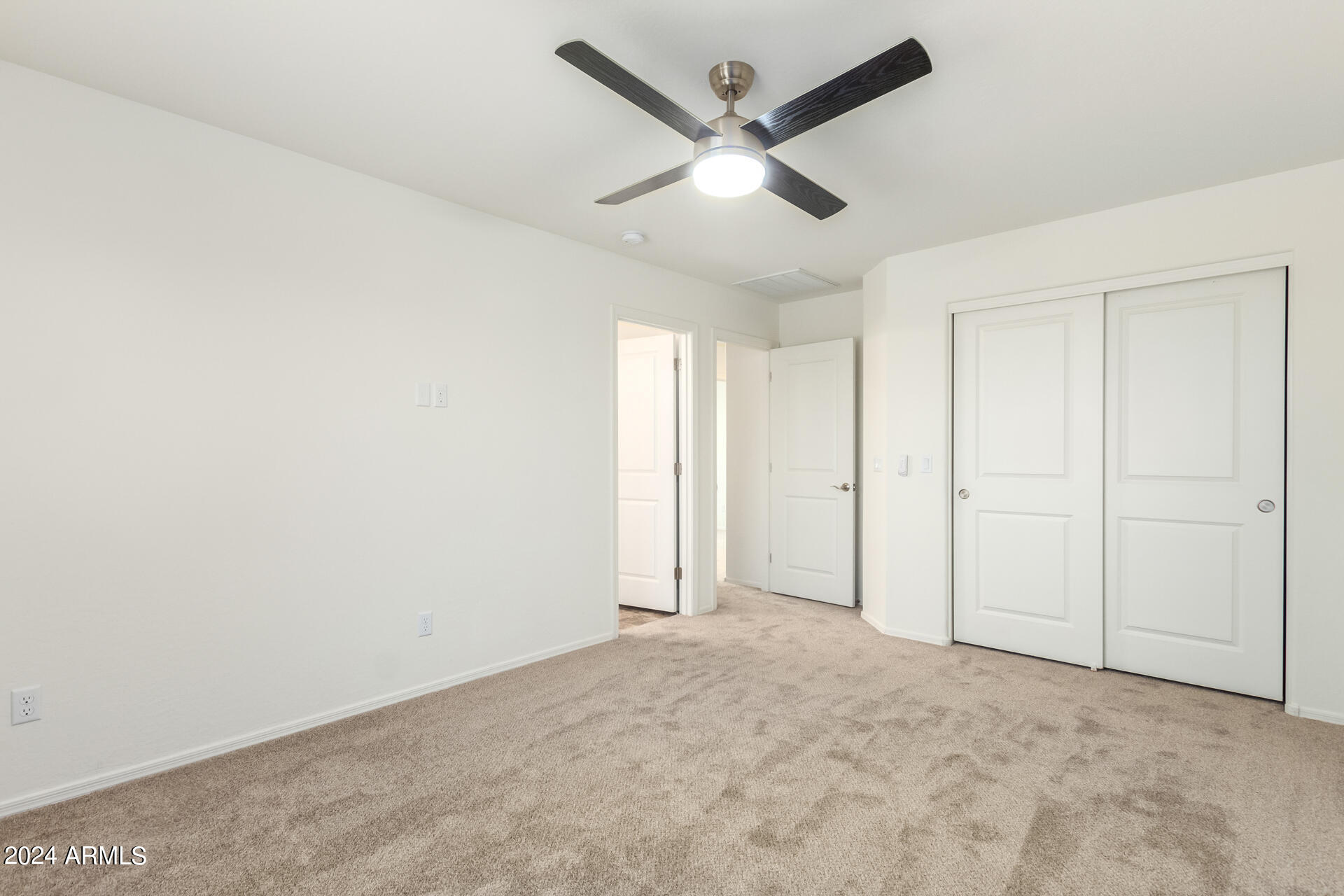 1832 South Hayley Road Apache Junction, AZ 85119 - Photo 23 of 30 an empty room with ceiling fan and windows