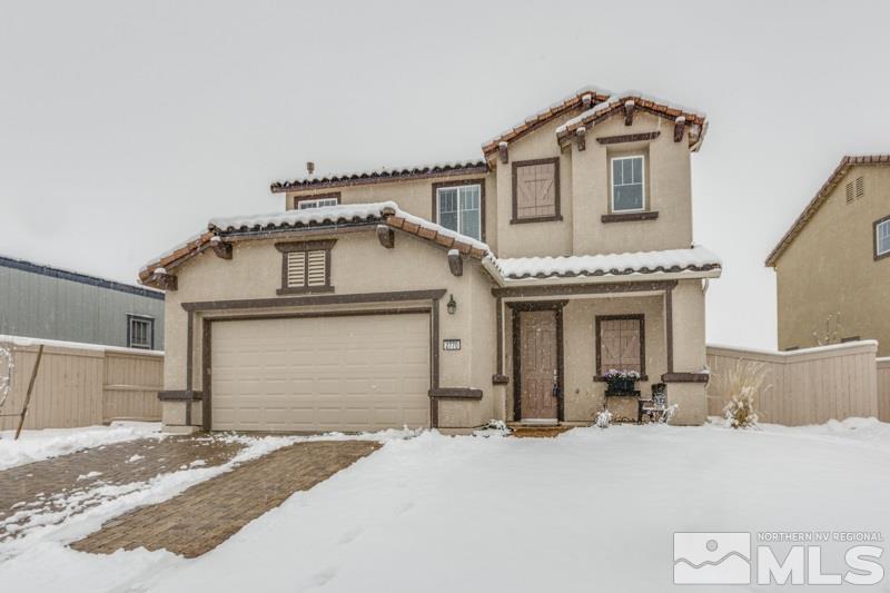 2770 Bonfire Lane Reno, NV 89521 - Photo 1 of 1 a front view of a house with a yard and garage