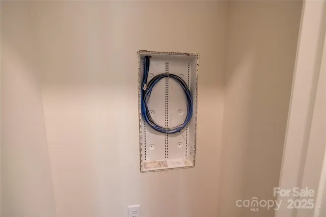 a close up of a mirror on a wall