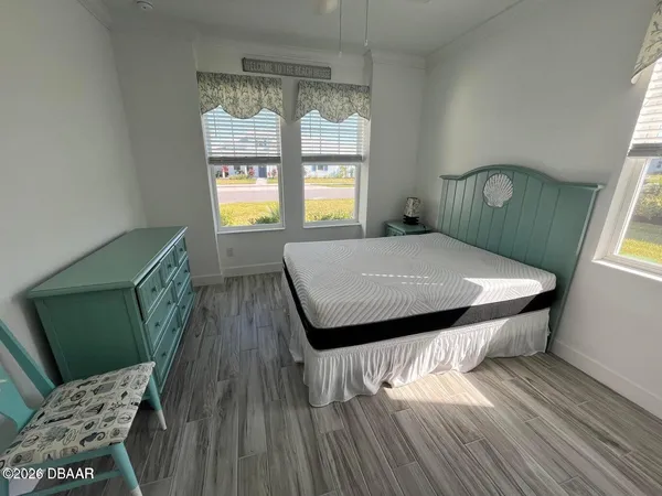 a bathroom with a bathtub toilet and shower