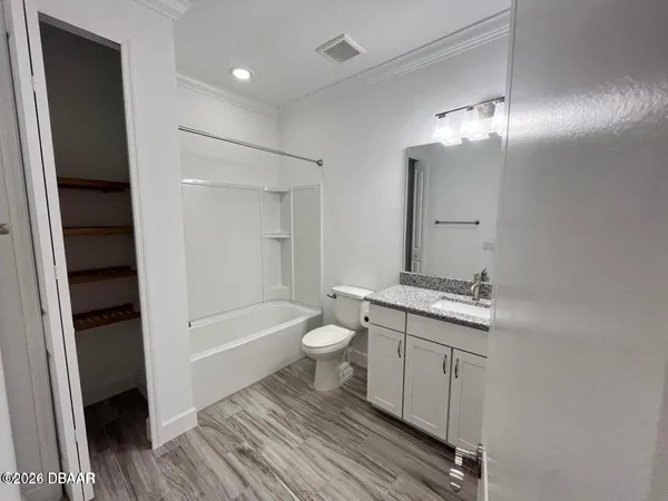 a view of a house with a garden