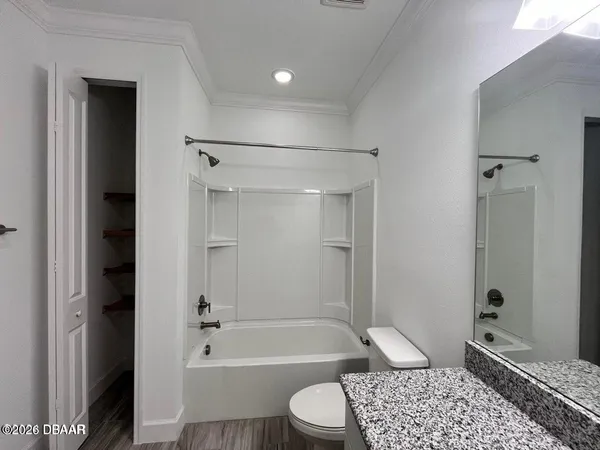 a bathroom with a shower curtain