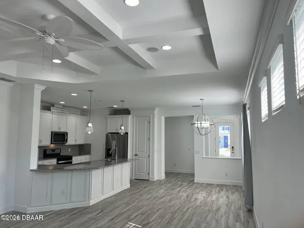 a view of kitchen and sink