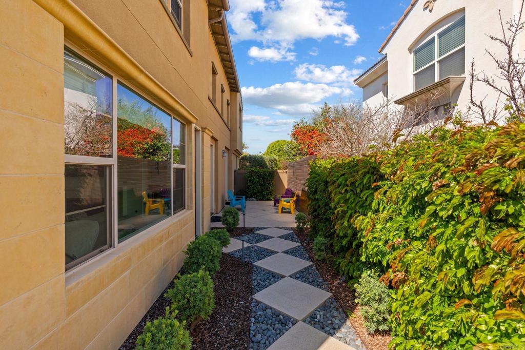 809 Dolphin Circle Encinitas, CA 92024 - Photo 51 of 71 a house with garden in front of it