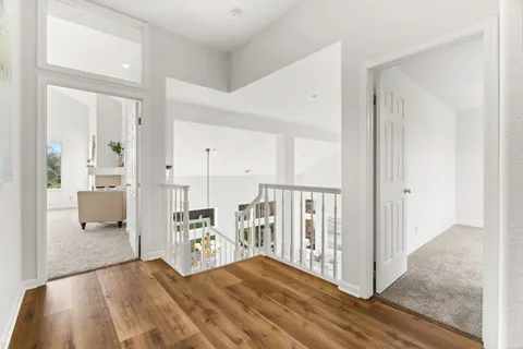 a bed room with bed and a night stand