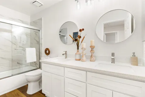 a spacious bedroom with a bed and a fireplace