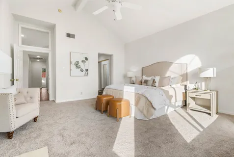a view of a chairs and table in the patio