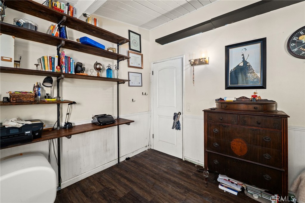 5208 North Leaf Azusa, CA 91702 - Photo 14 of 34 a view of a workspace with furniture and a book shelf