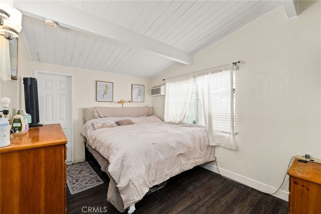 5208 North Leaf Azusa, CA 91702 - Photo 19 of 34 a bedroom with a bed and a flat tv screen on the dresser