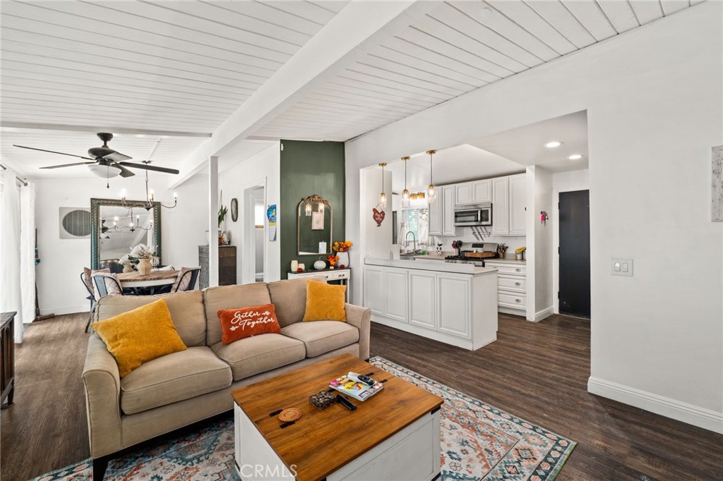 5208 North Leaf Azusa, CA 91702 - Photo 5 of 34 a living room with furniture and kitchen view
